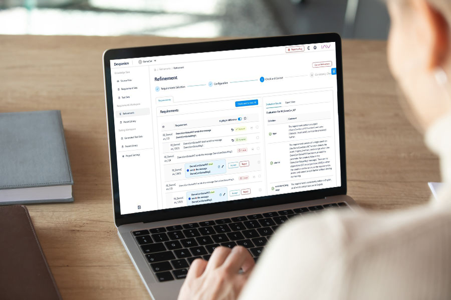Person seen from behind looking at a screen displaying the recognisable text “Refinement”.